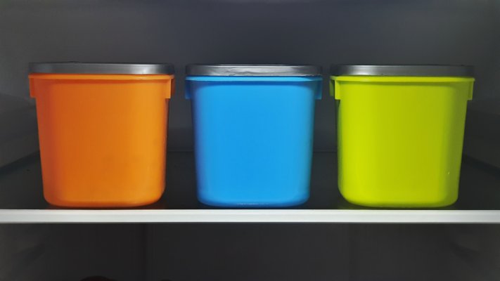 three plastic containers